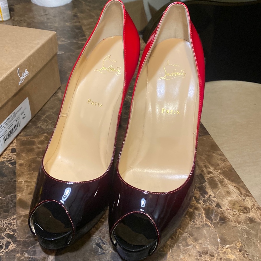 Christian Louboutin shoes size 42 comes with box bag and dust bags
